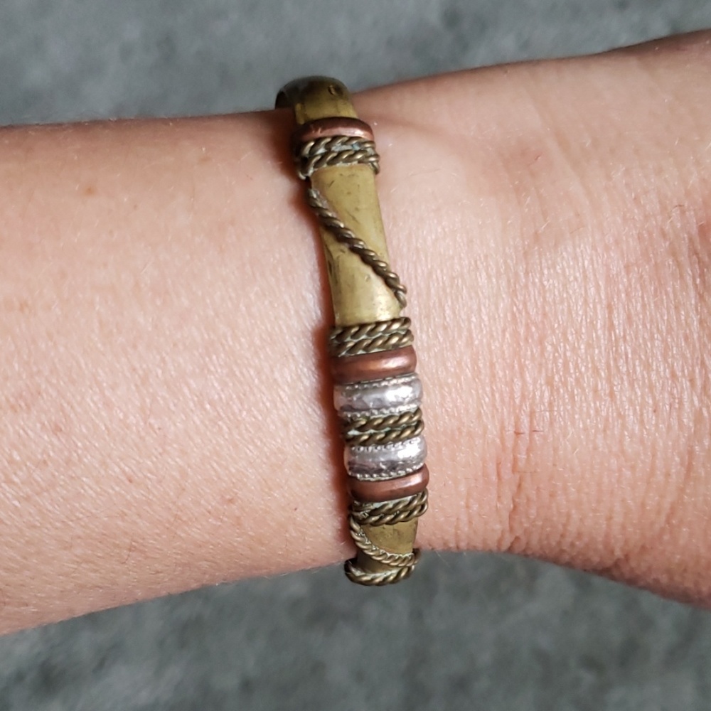 Brass toned adjustable bangle